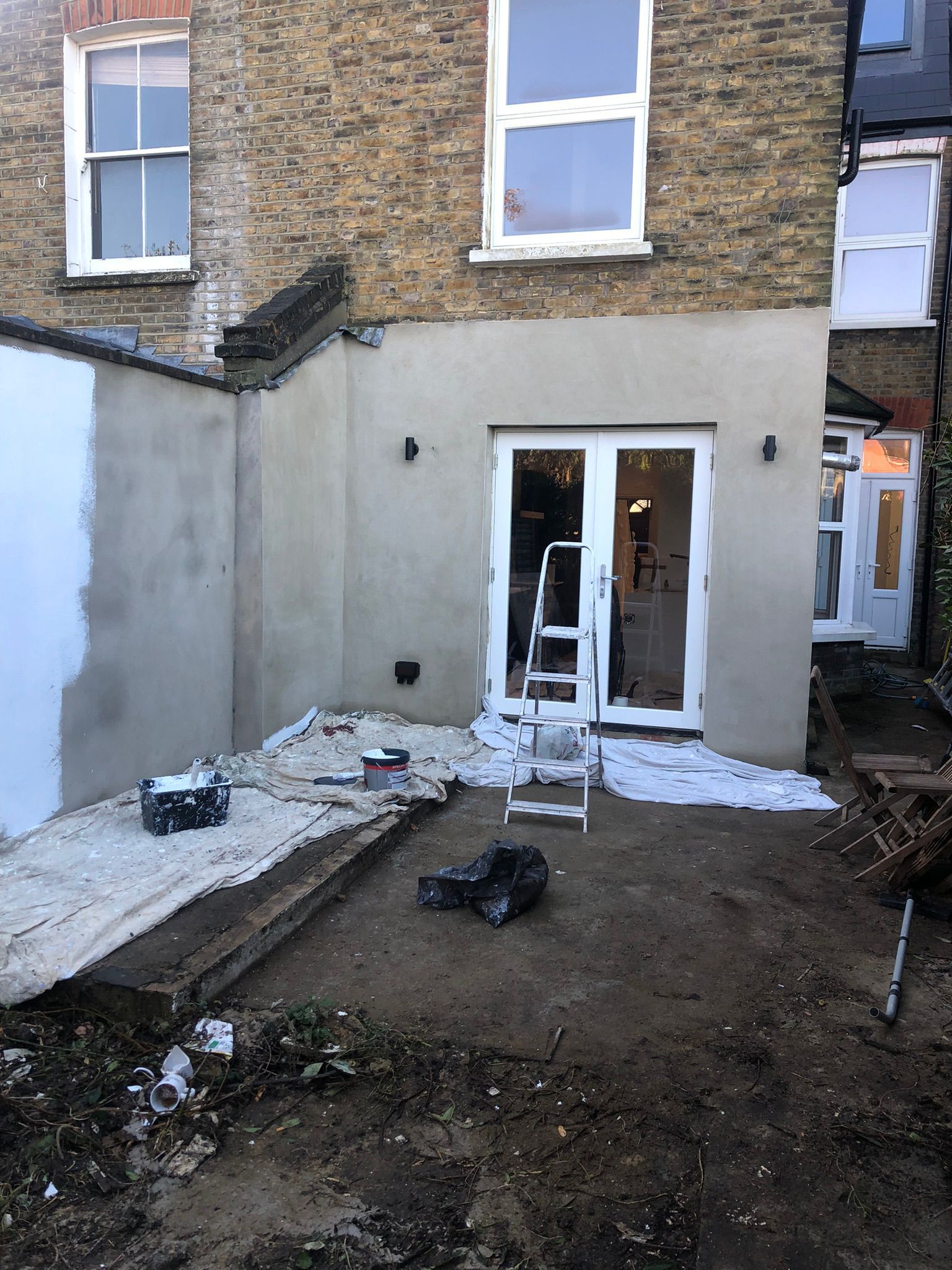Before exterior plastering and painting work in North London.