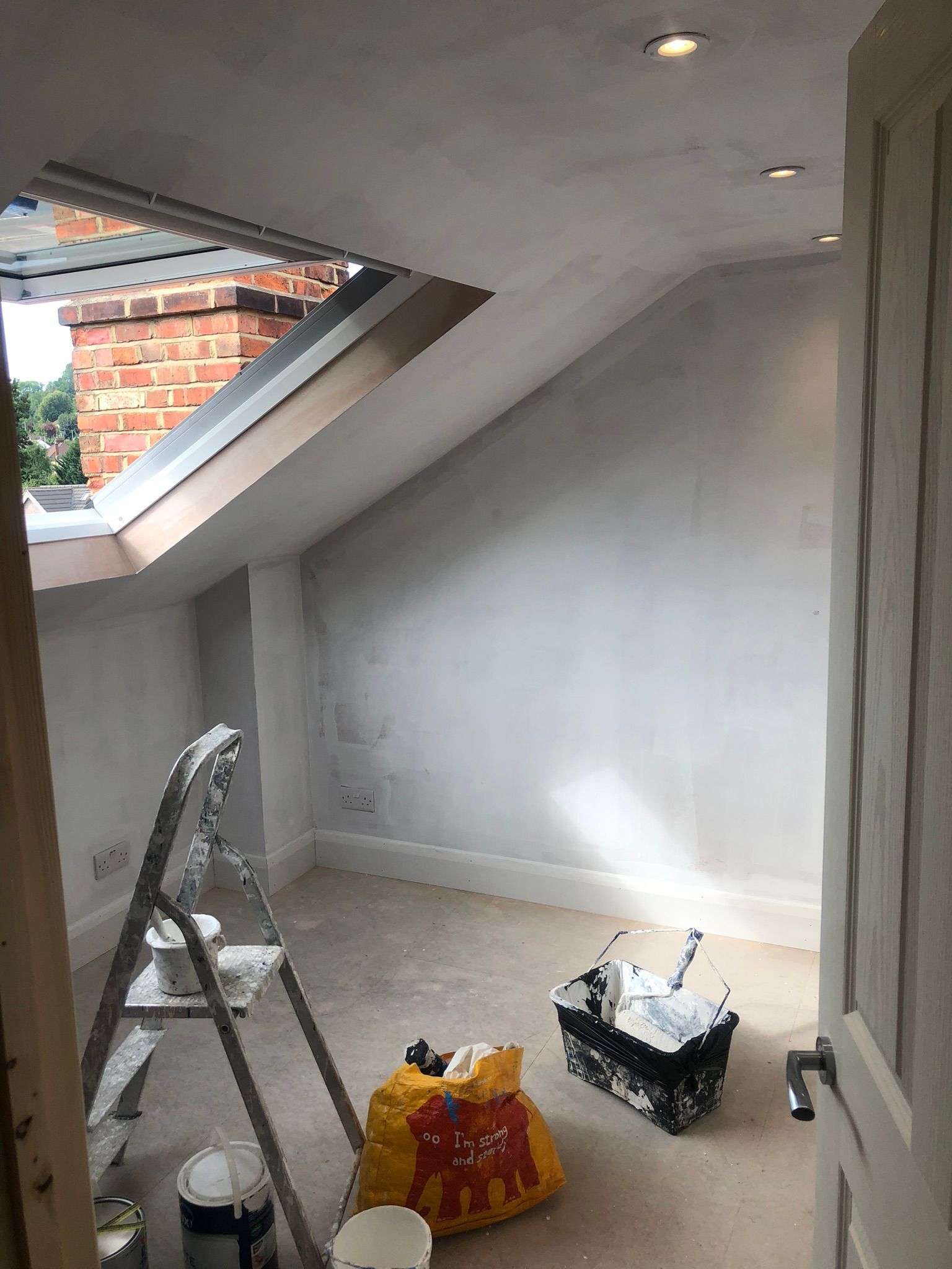 Before painting and decorating work in North London.