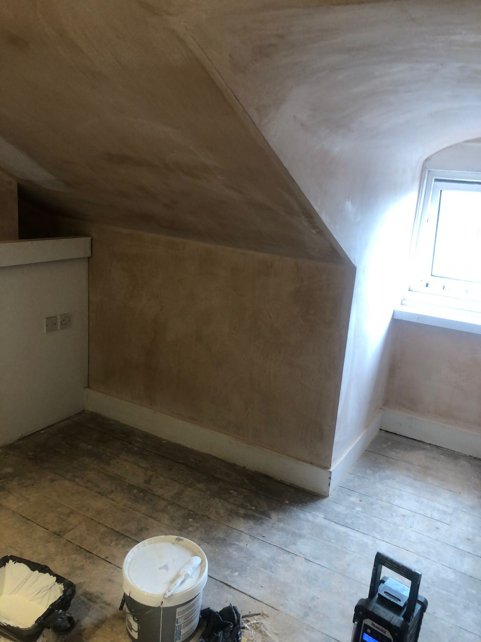 Before painting and decorating work in North London.